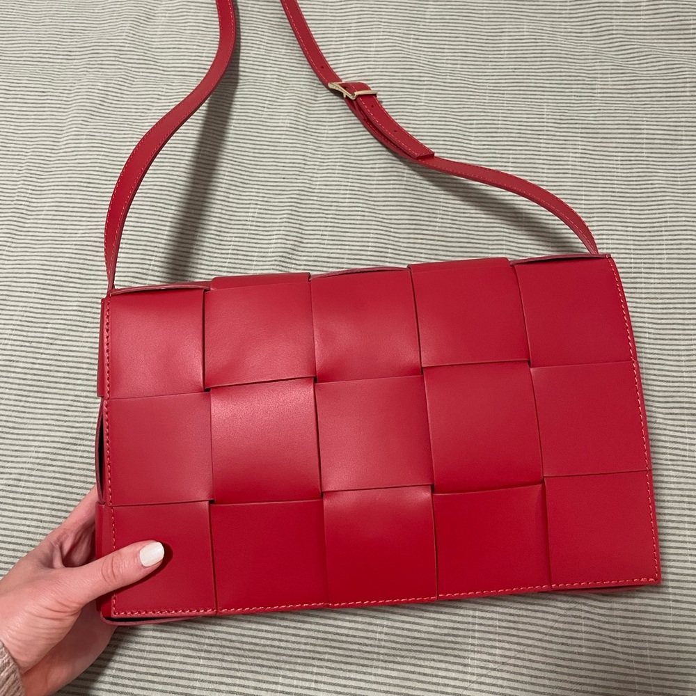 Woven red leather bag
